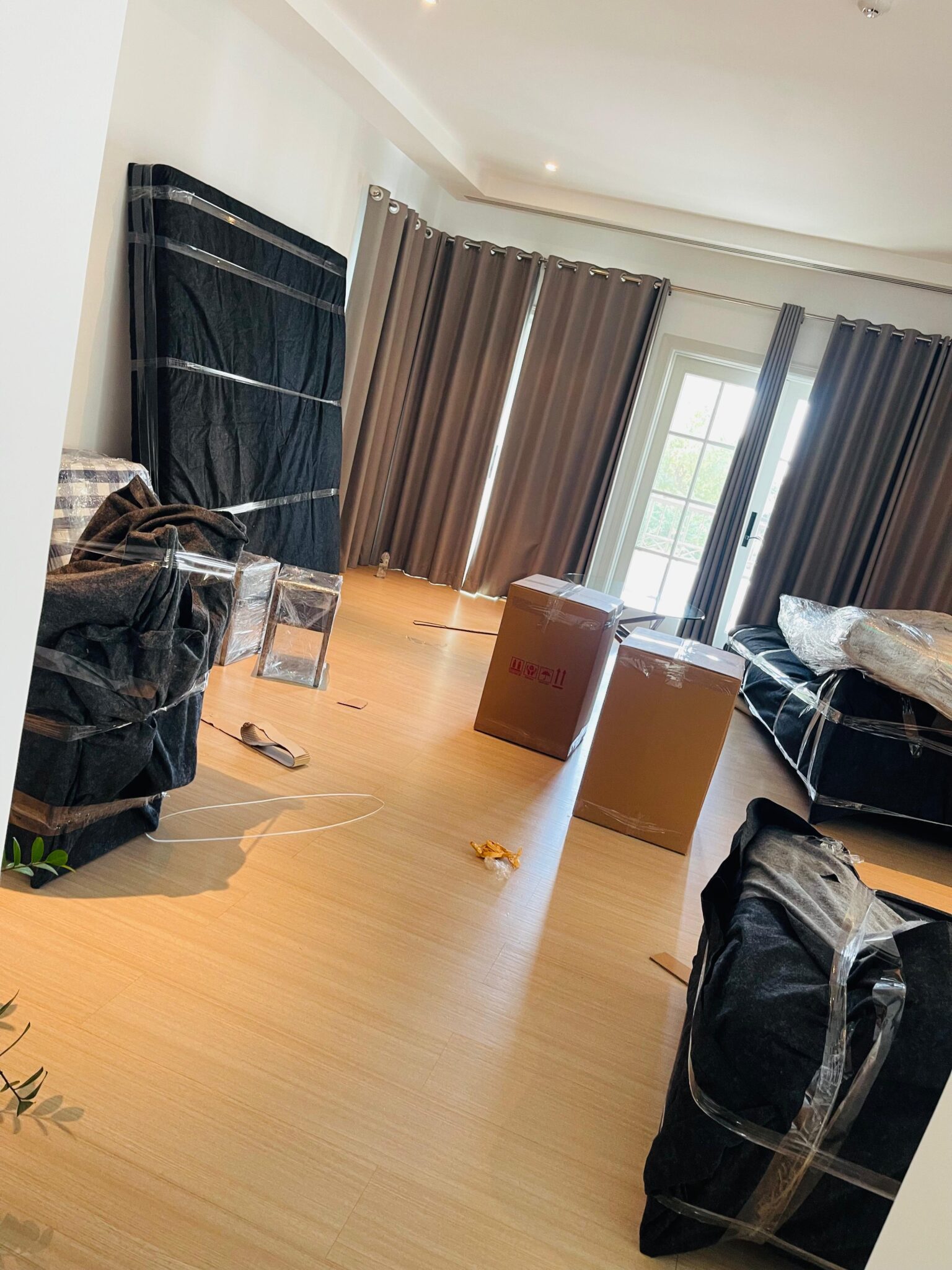 Professional movers packing items in Dubai